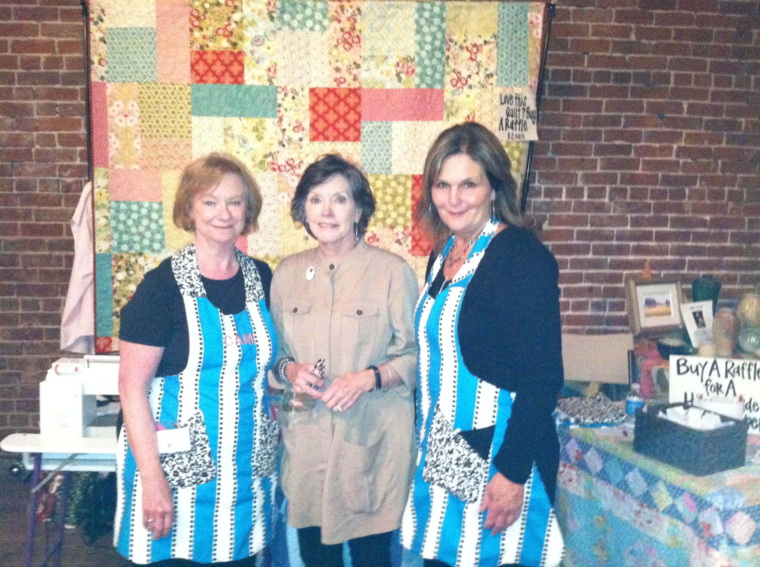 PHOTO: Quilters Cam McMillian, Lee Aylward, and Jan McCain
