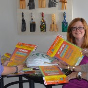 The Delta Center donates harmonicas to the Delta Arts Alliance to support musical classes.