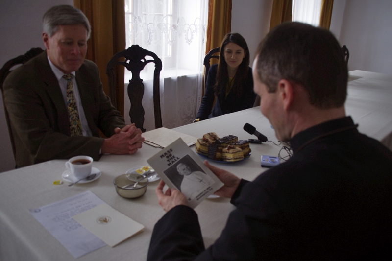 PHOTO: President William N. LaForge presents documents to the Center's Director, Rev. Piotr Drozd.   