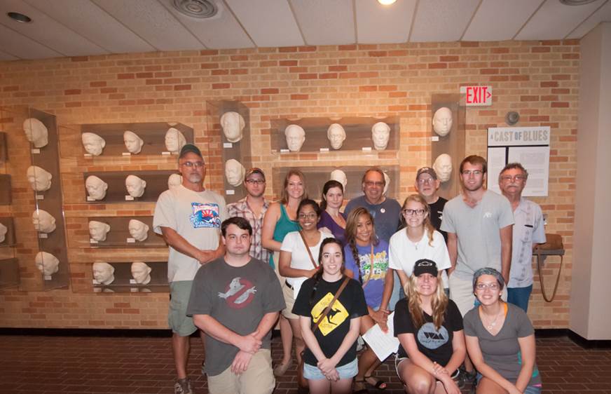 The class is pictured in front of artist Sharon McConnell’s collection of life-masked titled A Cast of Blues. The collection is on display in Ewing Hall on the Delta State campus, outside the Delta Center for Culture and Learning offices. 