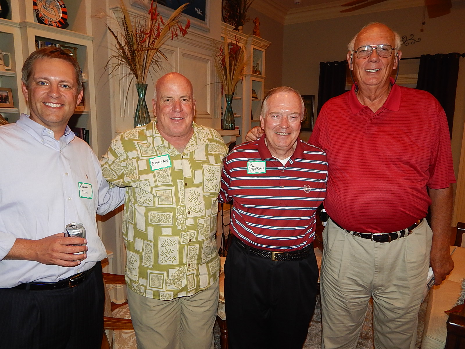 Photo: Richard Myers, National Alumni Association President; Barry Lyons, General Al Hopkins, and Tommy McKiernon enjoying each other’s company at the alumni meeting. 
