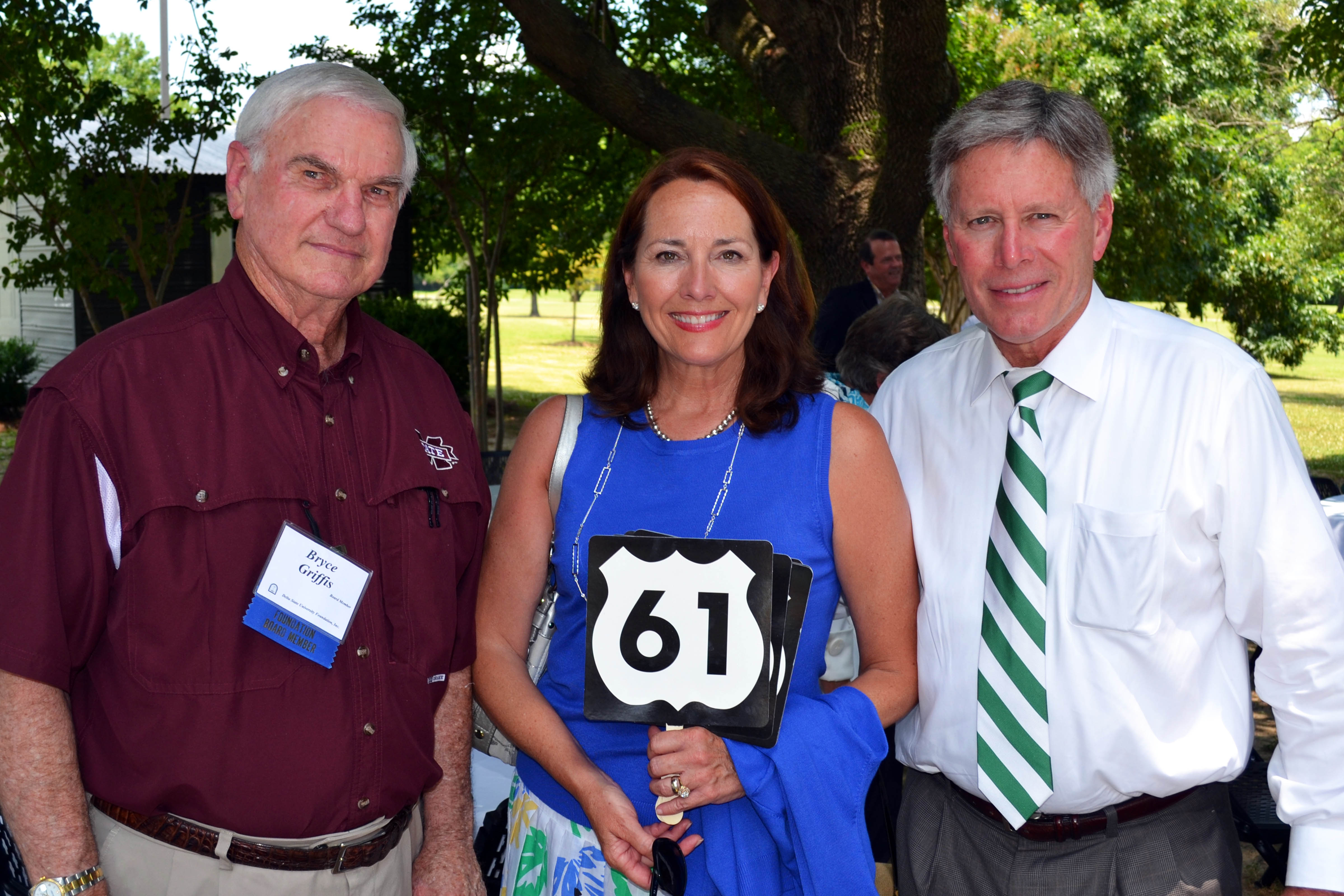 PHOTO:   Delta State University alumnus, Bryce Griffis, First Lady, Nancy LaForge, and President William N. LaForge talk at the post-meeting luncheon.  