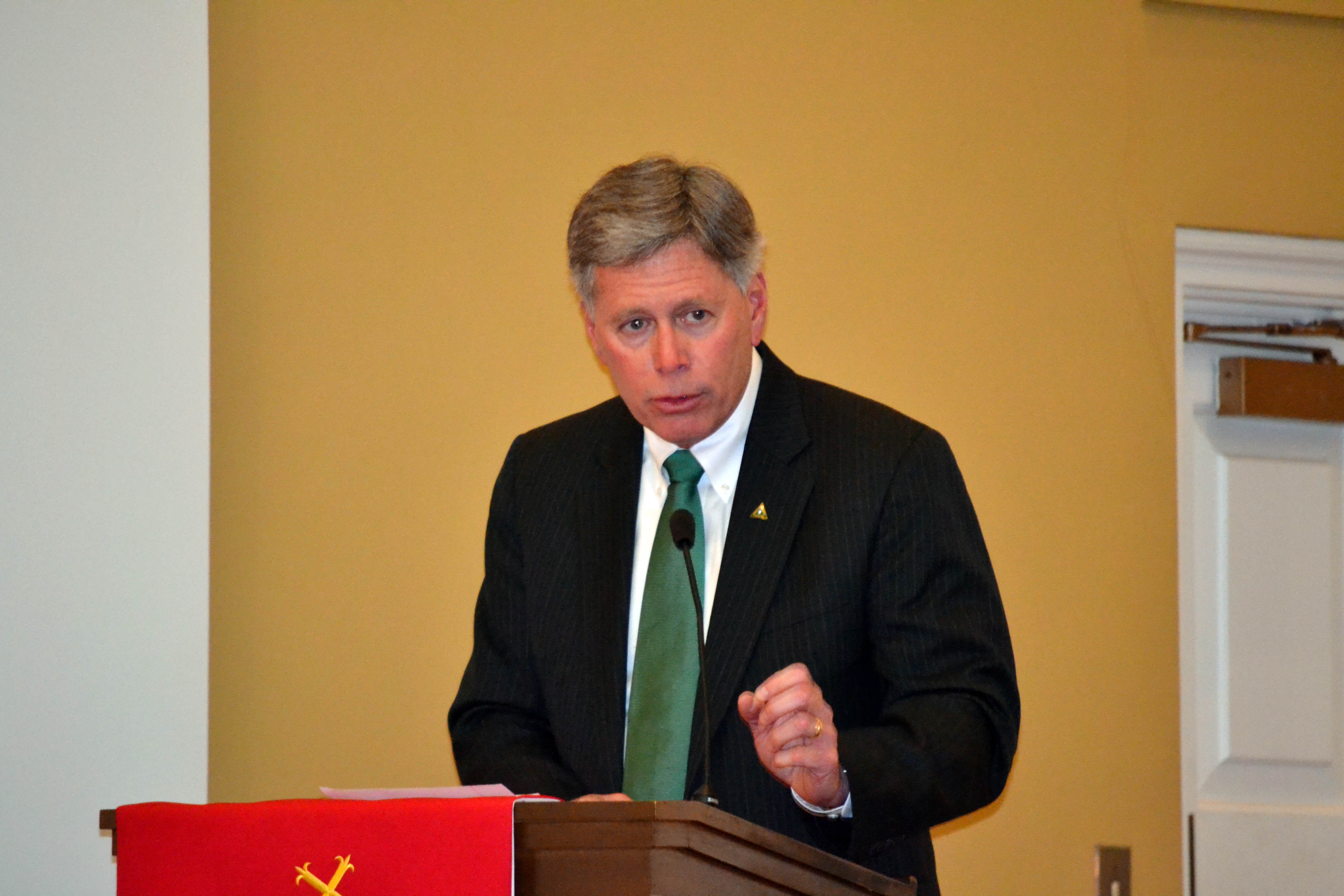 PHOTO:  Delta State University President William N. LaForge gives the graduation address to the 21 students graduating from Presbyterian Day School.