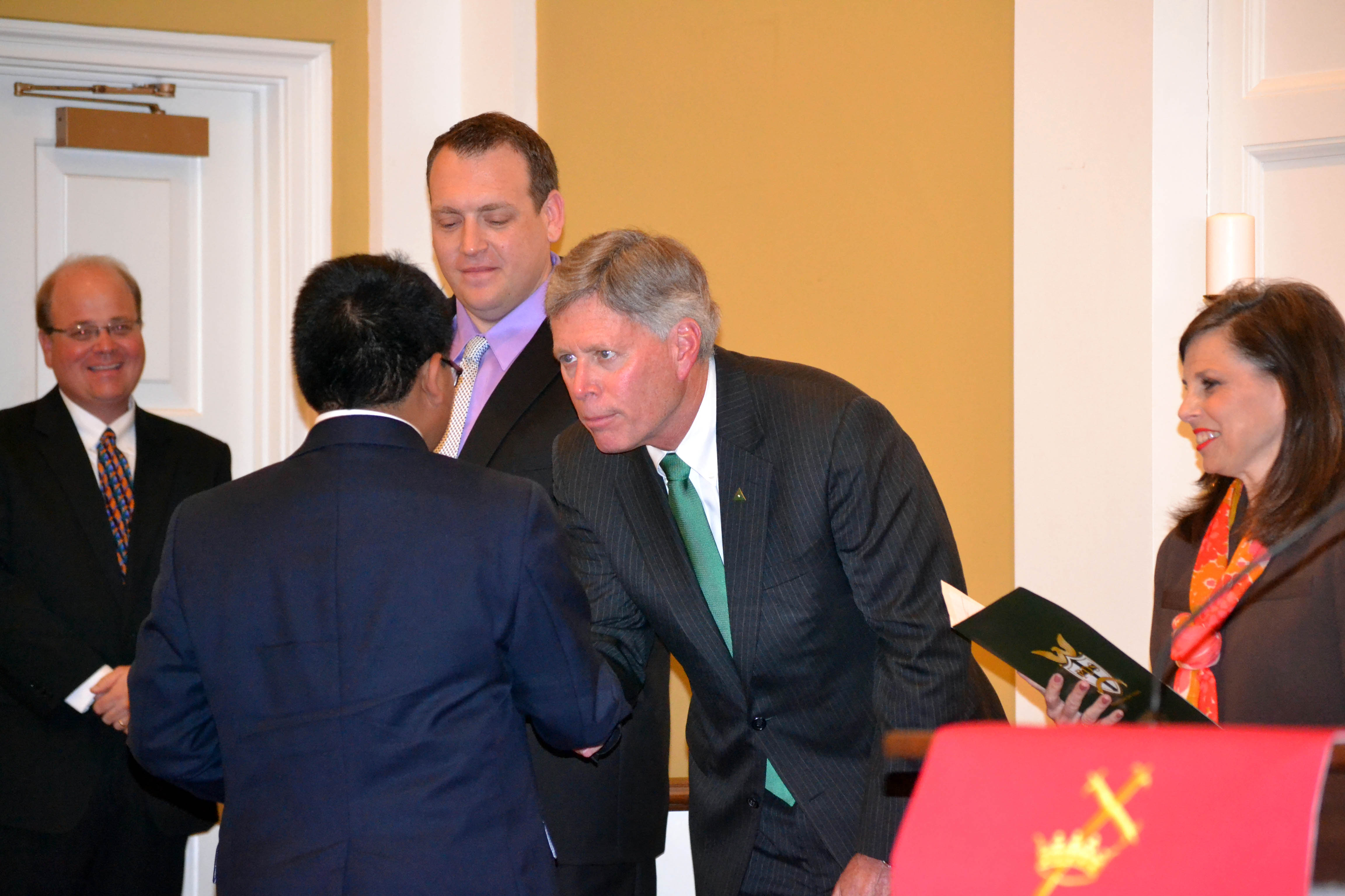 PHOTO:  Delta State University President William N. LaForge congratulates students graduating from 6th grade at Presbyterian Day School. 