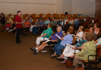 Photo: Luther Brown leads the Louisiana tour group. 