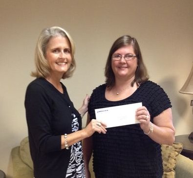 Photo: (Left to Right) Lisa Sandifer presenting the Missississippi Society CPAs Scholarhsip to Lisa Smitherman.