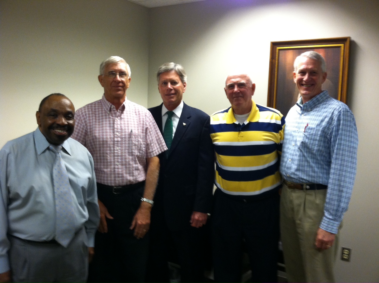 PHOTO:  L to R:   Dr. Billy Moore, Dr. Edd Milam, President William N. LaForge, James Garverick and Clint Wood discuss the plans for increasing scholarship funds for accounting students.