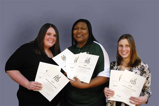 State Student Intern Graphic  Designer Casey Williamson, Web Writer/Designer Kimberly Cooley, and Graphic Designer Laura Fleeman Walker.