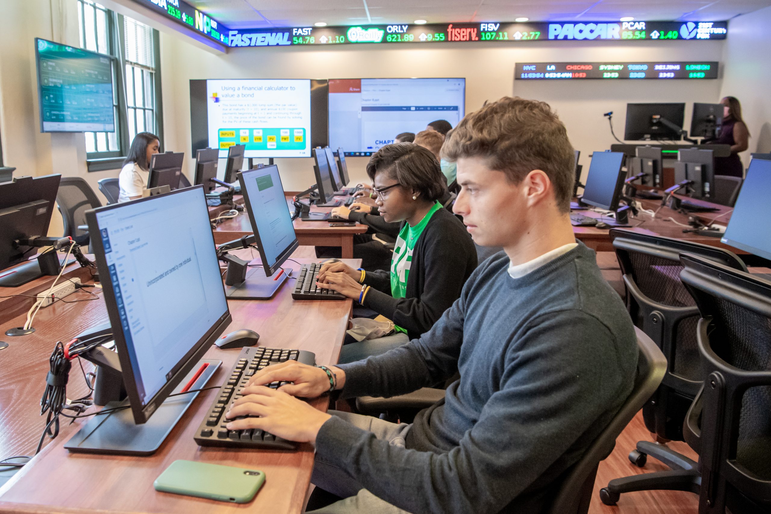 Students completing assignment during class time in the Finance lab.