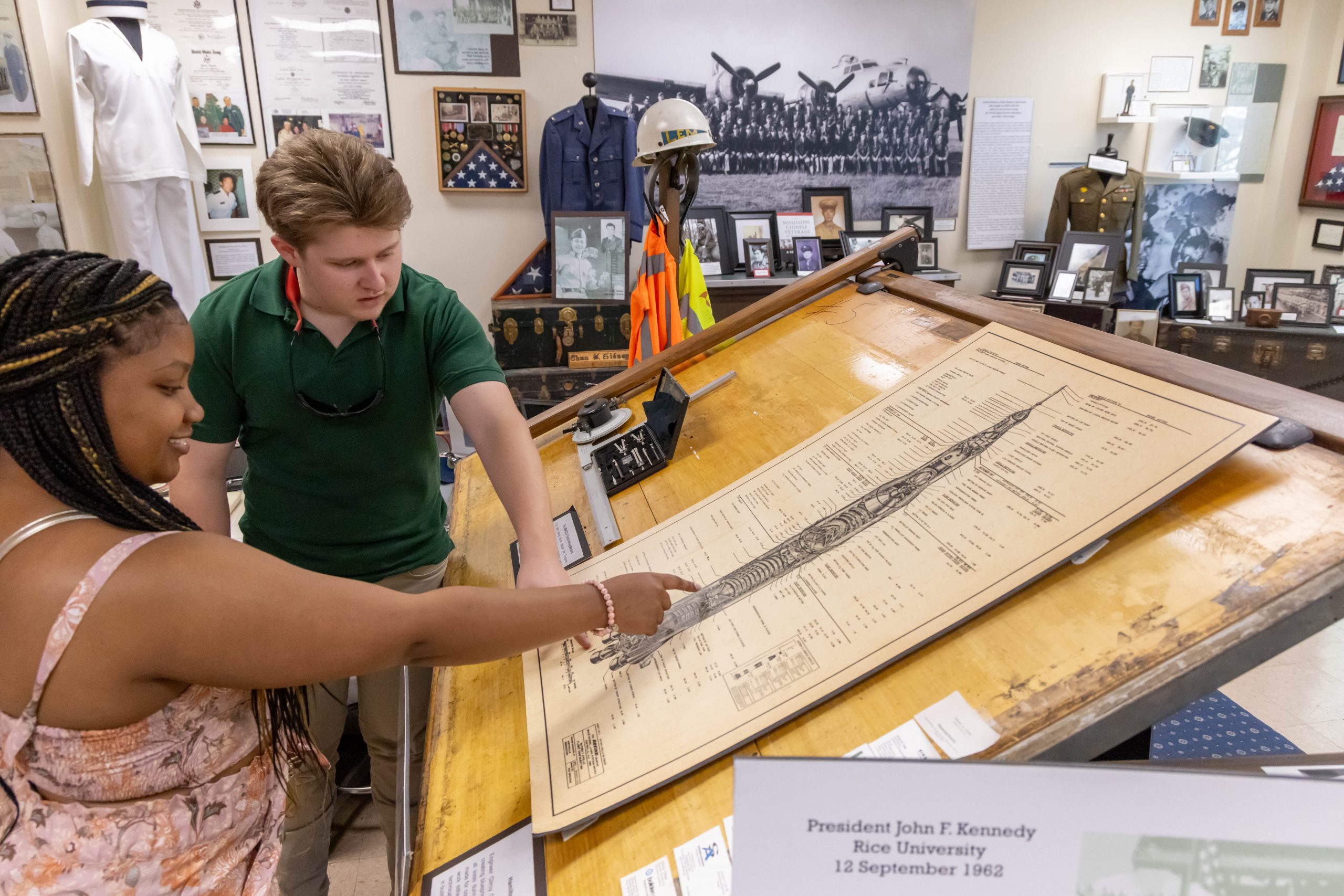 Two students looking at history artifacts in the Capps Archives and Museum.