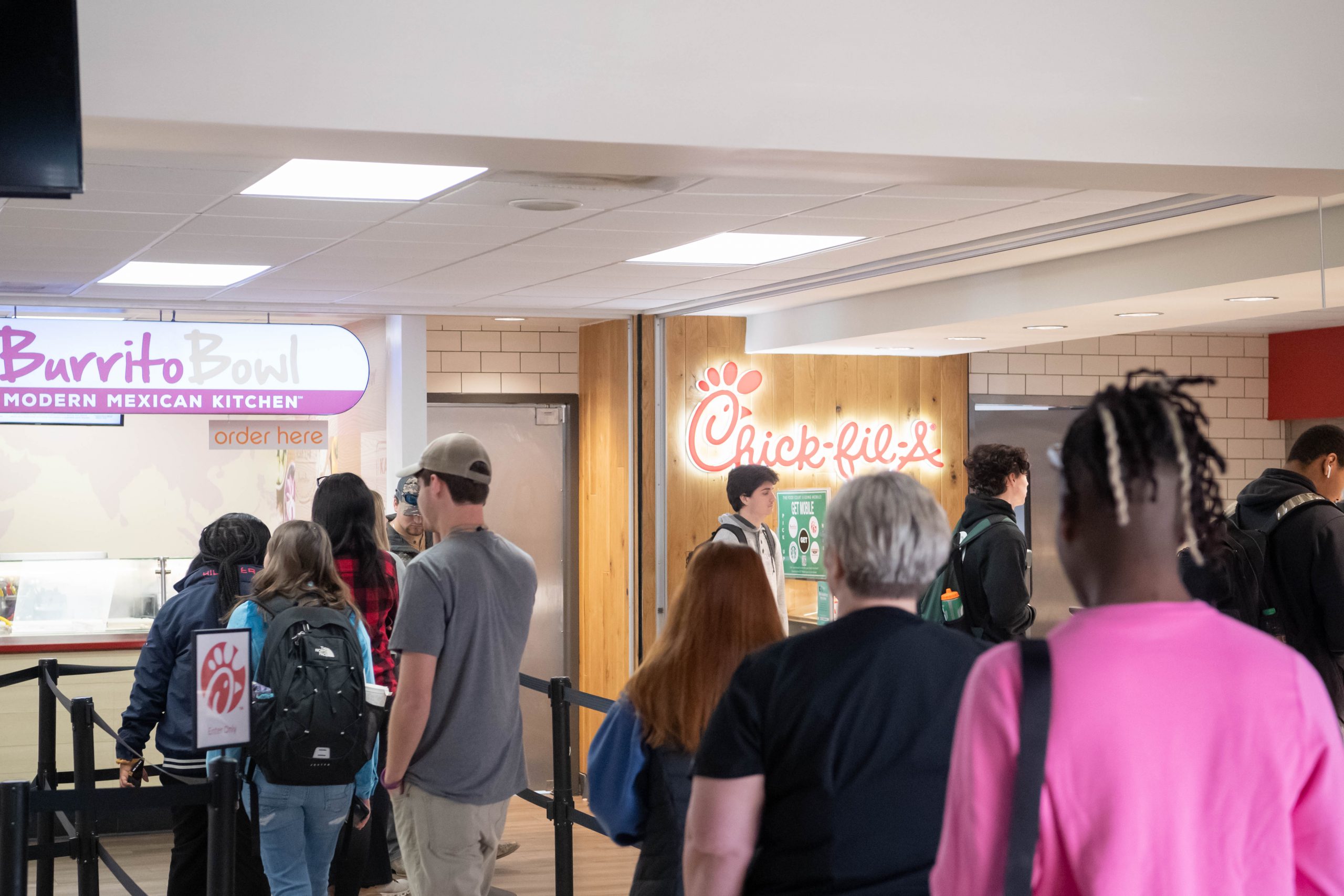 Students standing in line for lunch at the Food Court in the Student Union.