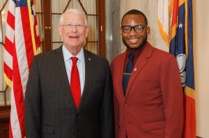 Photo of United States Senator Roger Wicker and Marketing major Fa’Darryl Cooper.