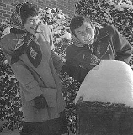 Students playing in snow