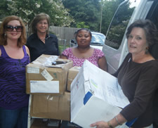 Kovarcik of the Delta Center, Kay Slater and Demitrice Dixon, from the Sunflower Public Library, and Lee Aylward of the Delta Center.