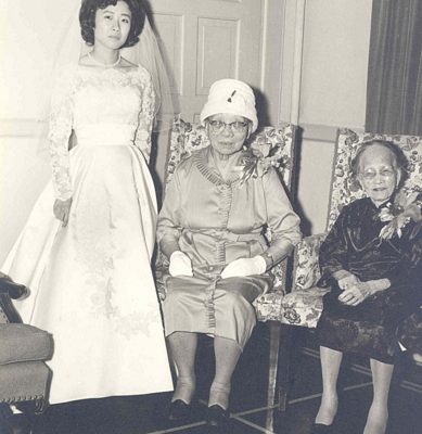 Bride with family, B&W.