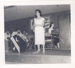 Woman on stage, B&W.