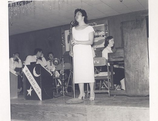 Woman on stage, B&W.