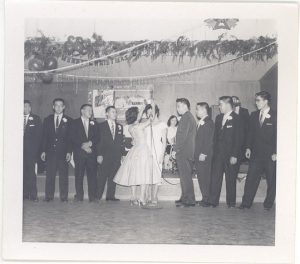 Men in line for a dance, B&W.