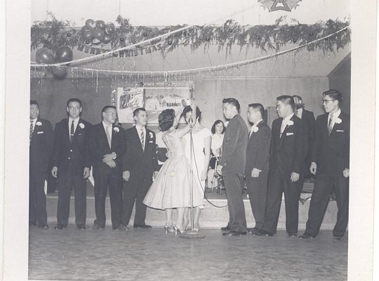 Men in line for a dance, B&W.