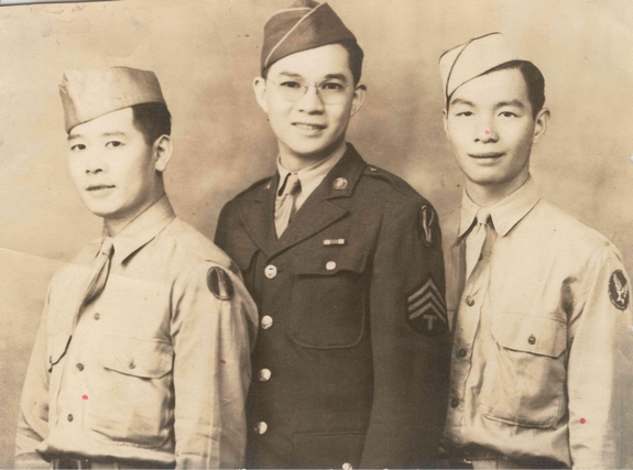 Three men in uniform, B&W.