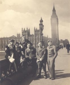 Mr. Jue and friends, in uniform in front of Big Ben in London, B&W.