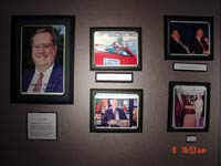 Wall of photos in museum