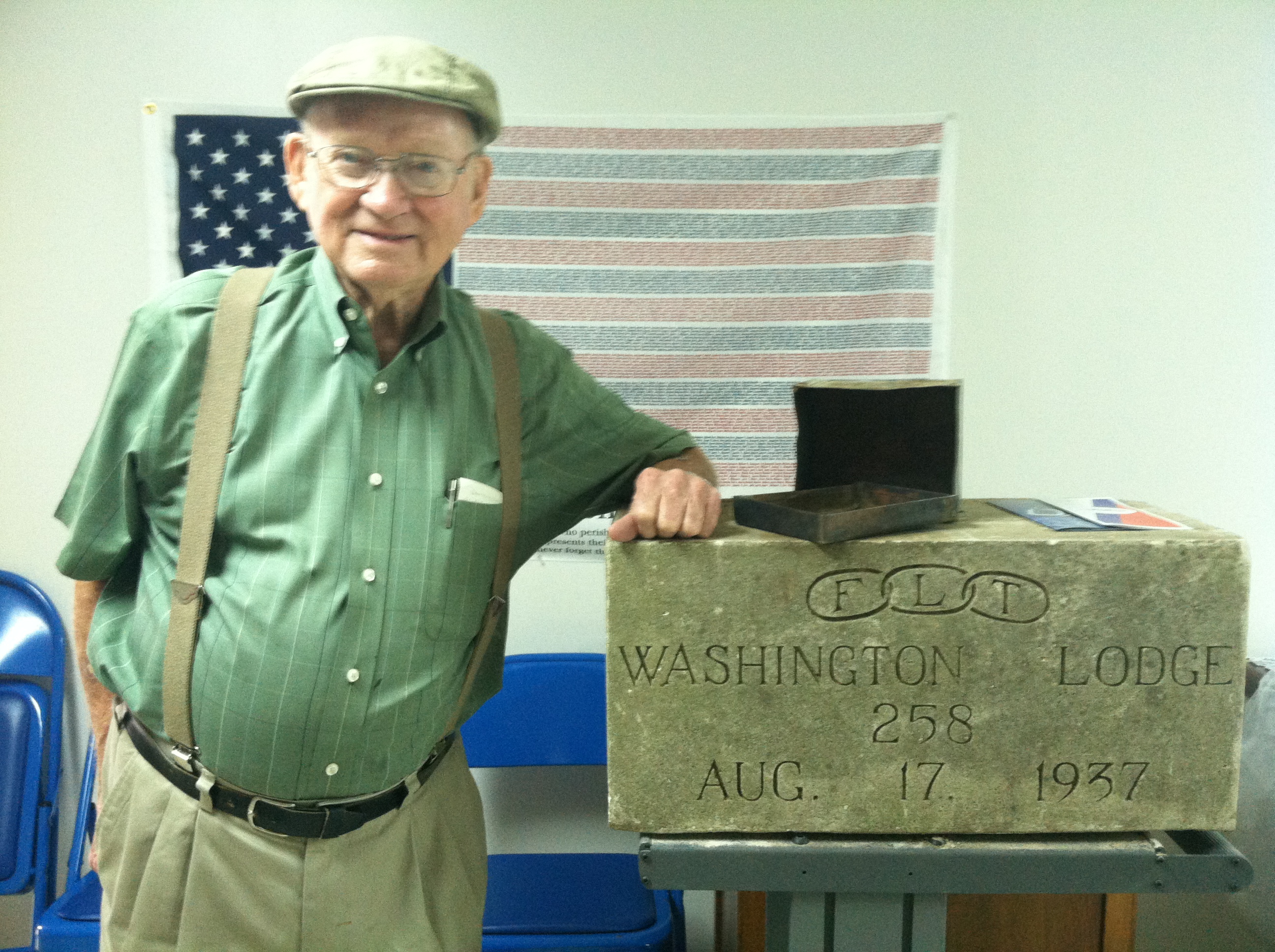 man with time capsule contents at Delta State Archives