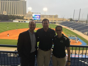 Jeffrey Farris ‘04/’05 (l to r), director of Alumni Affairs; Brett Walker ’05, Hancock Investment Services; Cristina Coca ’13, director of Community Relations at MGM Park.