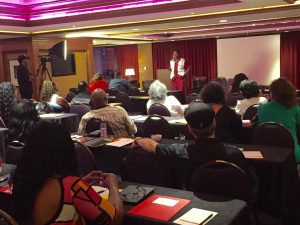 Bobby Rush speaks to conference attendees before performing.