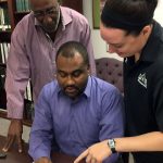 Newman, right, works with James McBride, president of the Bolivar County Board of Supervisors, and Will Hooker, Bolivar County administrator.