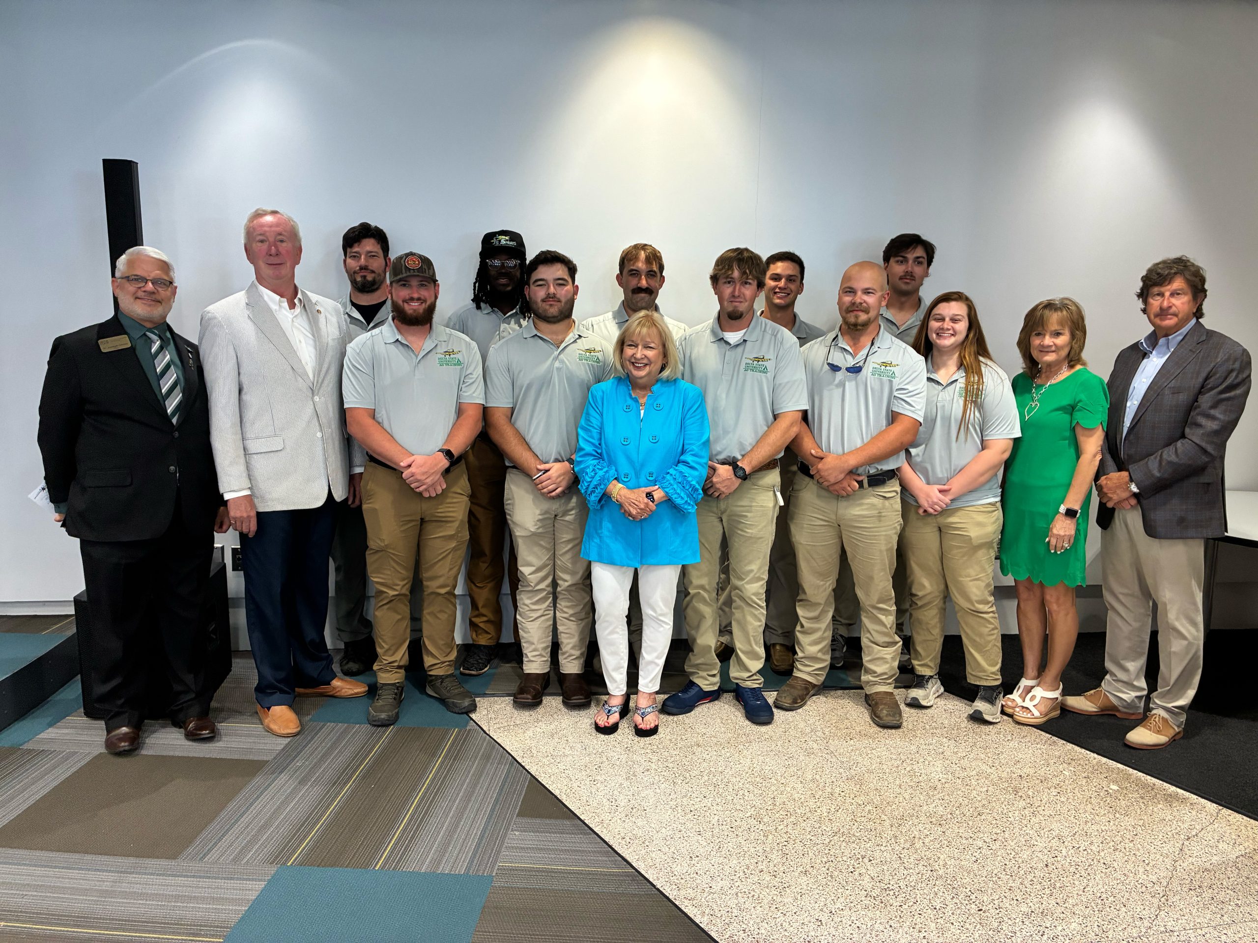 students from the ag aviation program posing with program leaders