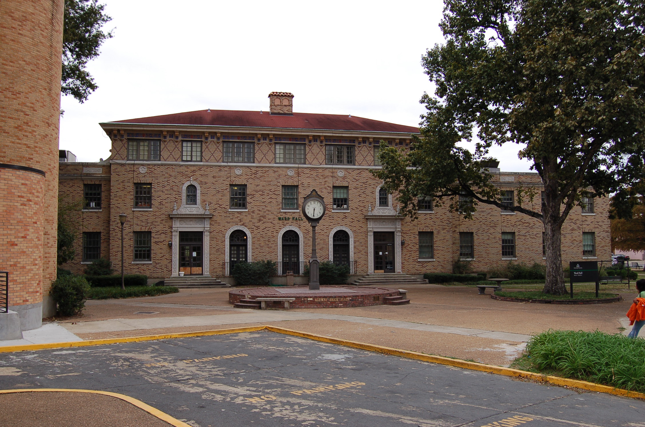 Ward Hall, a tan brick dormitory building on Delta State's campus