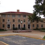 Ward Hall, a tan brick dormitory building on Delta State's campus